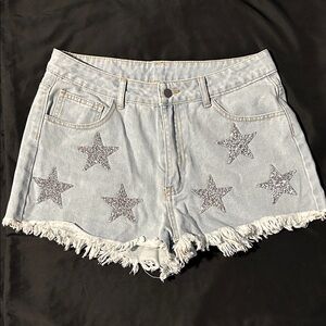 NWOT Stylish Light Blue Denim Shorts with Star Accents